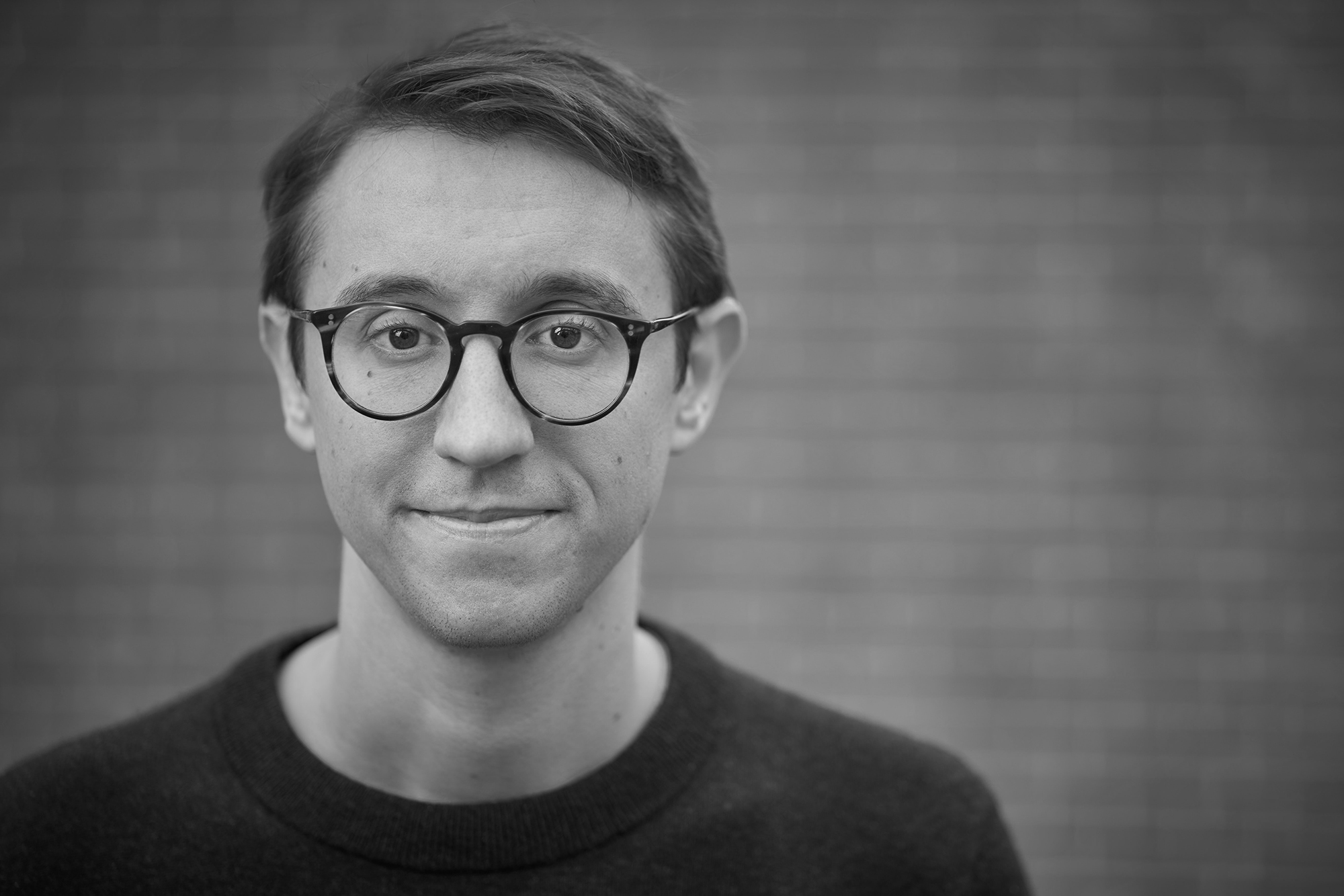 Oliver Phillpott, CEO of Generational in black and white head and shoulders portrait