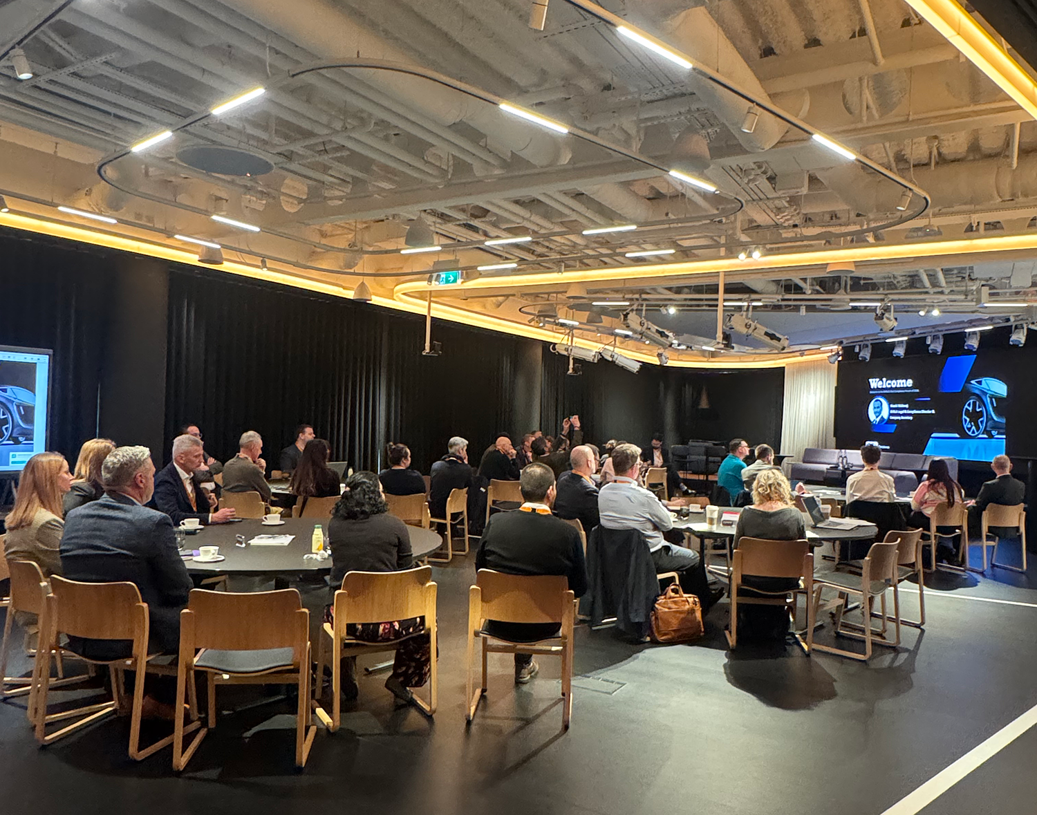 Delegates seated around tables at the offices of Norton Rose Fulbright in London for the BVRLA Compliance Forum March 26
