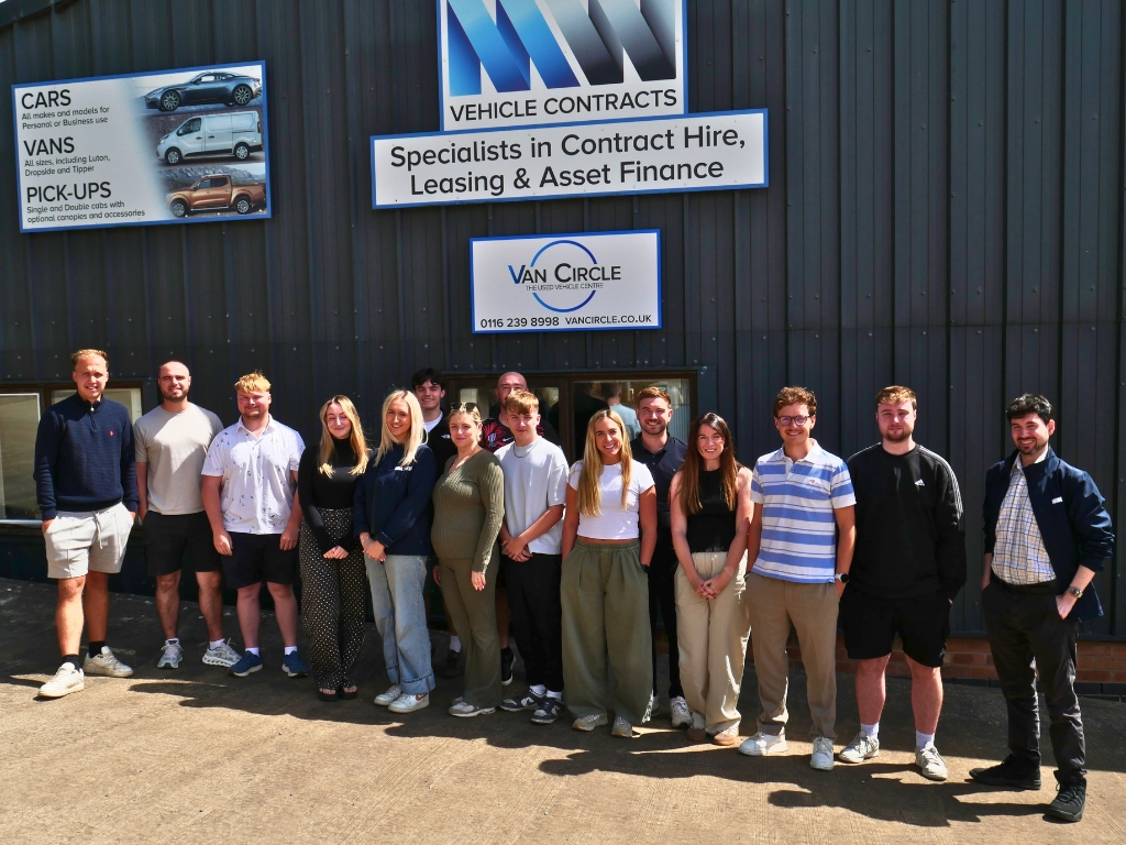 M W Vehicle Contracts Ltd staff stood outside the office