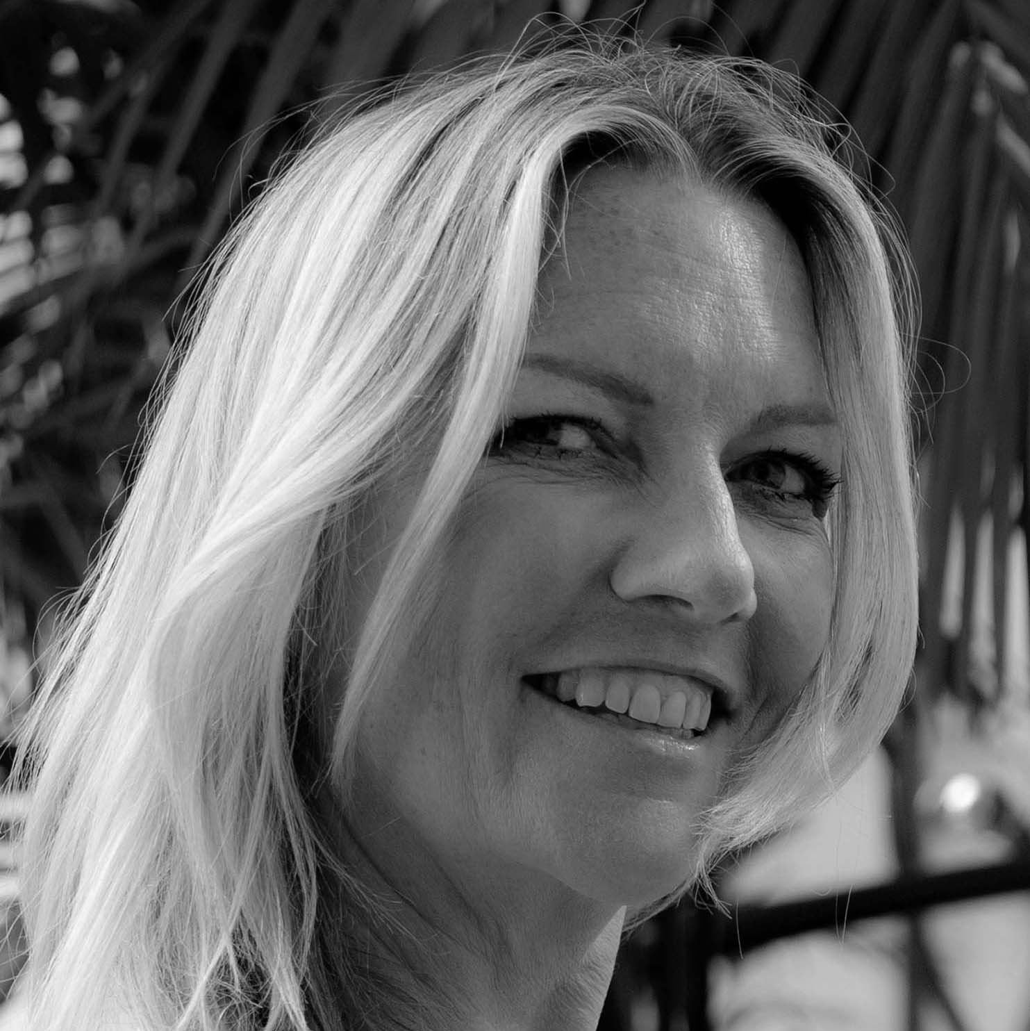 Black and white image of Shannon Faulkner, Consultant, Auxillias